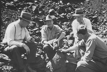 Figure 3 Champion of Leigh Creek coalfield, former premier Tom Playford (left) examines coal in an open-cut pit in 1944. (Photo N002297)