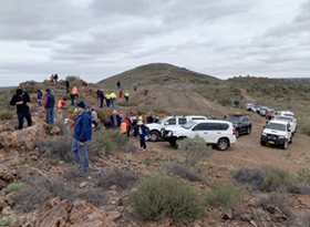 Field trip participants examining the Broken Hill Line of Lode, shown here at Perilya’s Broken Hill Operations northern leases.