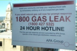 A photo of a sign showing the APA Group emergency/gas leak reporting number (1800 GAS LEAK – 1800 427 532)