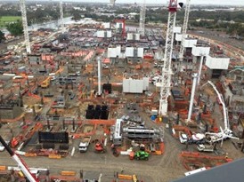 Photo showing New Royal Adelaide Hospital under construction, including lots of cranes.
