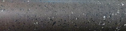 Figure 10(a) Amygdaloidal basalt with vesicles filled by chlorite and carbonate.