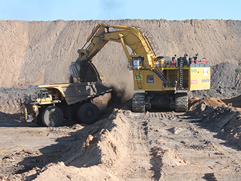 Figure 7 Collecting fine, clay-rich material that is non-combustible for use as a cover to reduce water and oxygen ingress. (Courtesy of Flinders Power; photo 416243) Figure 7 Collecting fine, clay-rich material that is non-combustible for use as a cover to reduce water and oxygen ingress. (Courtesy of Flinders Power; photo 416243)