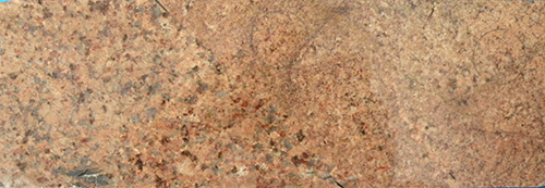 Figure 7 Textural banding ~45° to core axis, Samphire granite, red granite domain. MRC009, PQ core, unoriented. (Photo 416225)