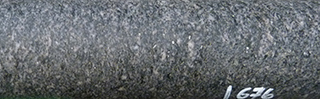 Figure 7(a) Foliated texture of the shoshonite.
