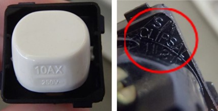 Photos showing an example of approval labelling for an OTR (S marking) approved product on a wall switch