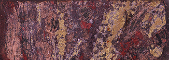 Figure 3c Partly calcite–sulfide–hematite retrogressed, garnet–pyroxene–sulfide skarn. Drillhole GHDD1, 854 m. (Photo 416632)